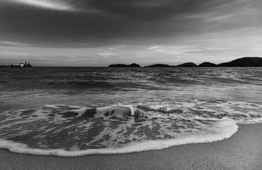 Beach sunset or sunrise with sky and cloud in twilight, Black and white and monochrome style