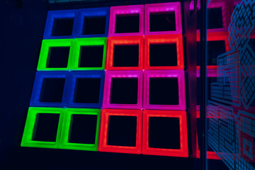 colored cubes on black background