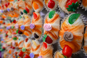 croissant with colored fruits