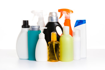 Cleaning product plastic multi-colored container for house clean on white table and isolated. household chemicals