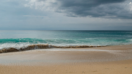 Fototapeta na wymiar Seascape in Bali. Sea, beach, sky. Beach vacation
