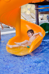 cute little girl playing in the pool