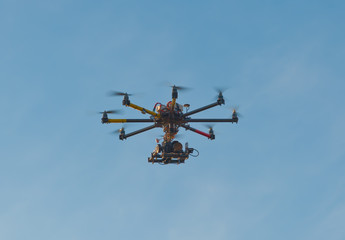 Non-serial drone with a camera in flight.
