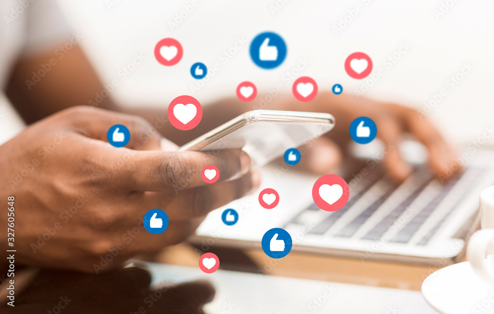 Poster online networking. african american man using social media on smartphone, design with like icons