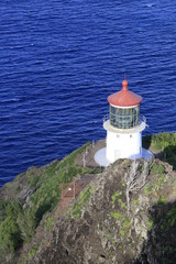 lighthouse on coast of sea