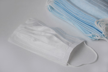disposable protective masks, concept of individual protection against virus, COVID-19 coronavirus, flu, infection