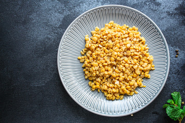 dry yellow peas boiled porridge healthy food (meat product sausage) menu concept background. top view. copy space for text