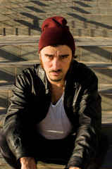 young cool man and a hard and defiant expression