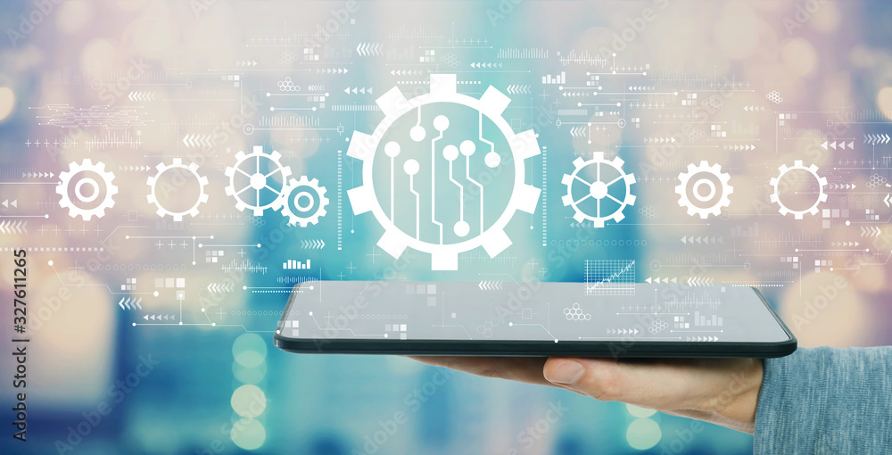 Poster automation concept with man holding a tablet computer