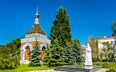 Fototapeta na wymiar Alexius Chapel and statue of Sergius of Radonezh in Samara, Russia