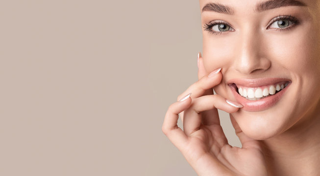 Attractive Girl Smiling Touching Lips Posing In Studio, Panorama