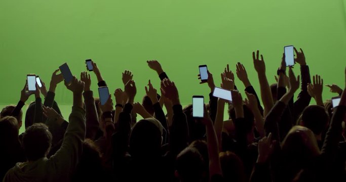 GREEN SCREEN CHROMA KEY Model Released, Back View Of Huge Crowd Dancing And Cheering At A Concert Or A Show. Shot On RED Helium 8K In RAW