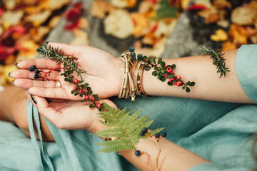beautiful female hands in bracelets