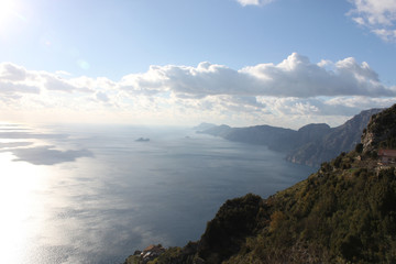 Fototapeta na wymiar clouds over the mountains and sea italy amalfi coast