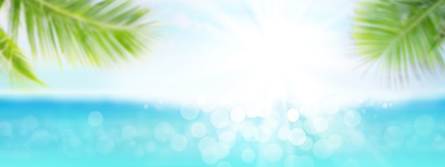 Fototapeta na wymiar Summer tropical sea with sparkling waves and blue sunny sky