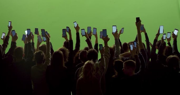 GREEN SCREEN Back view huge crowd of people with phones in hands at live concert or show. Shot on RED Helium 8K, Prores 4444