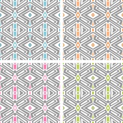 Set of four seamless pastel colored geometric pattern over white background