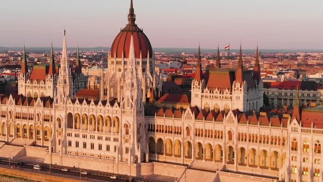 Aerial view of Hungarian Parliament from the Danube river at sunset, Budapest, Hungary