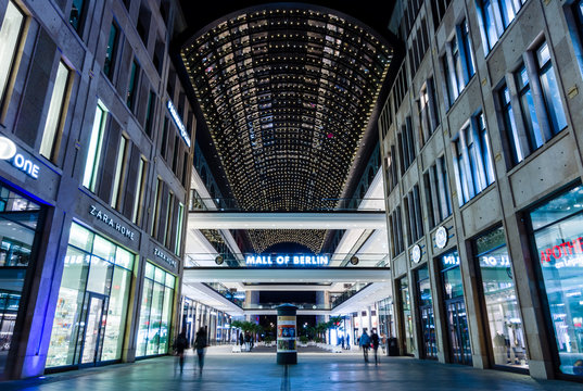 BERLIN - OCTOBER 08, 2016: A new and modern shopping mall at Potsdamer Platz "Mall of Berlin" in the evening illumination.