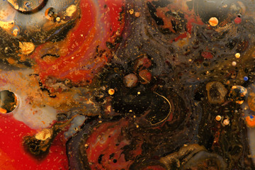 Macro Abstract bubble marble texture background. Acrylic color in water and oil.