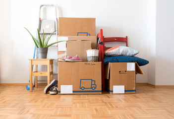 Move. Cardboard boxes, cleaning things and stuff for moving into a new, clean and bright home