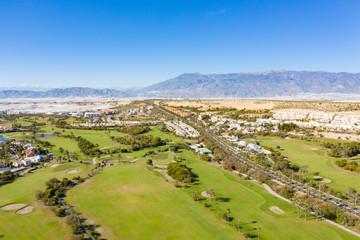 Fototapeta premium Aerial view of the golfcourse in Almerimar Spain on a sunny day 
