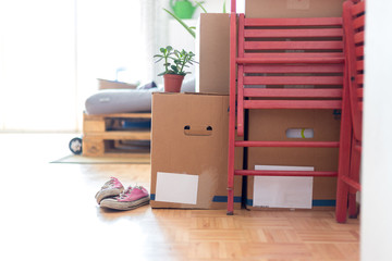 Move. Cardboard boxes, cleaning things and stuff for moving into a new, clean and bright home