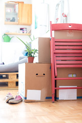 Move. Cardboard boxes, cleaning things and stuff for moving into a new, clean and bright home