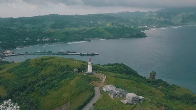 Cinematic aerial drone video of a romantic lighthouse of Basco Batanes in the Philippines.