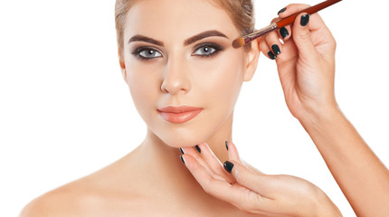 Portrait of a beautiful happy woman with long eyelashes, beautiful make-up, thick eyebrows and with...