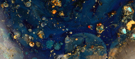 Macro mystical Abstract blue color marble horizontal texture background. Acrylic color in water and...