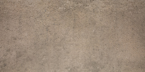 gray beige porous granular wall background texture with paint color rough surface plaster