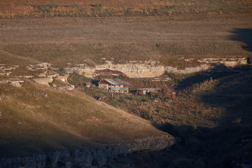 Obraz premium Mountain hut at sunset