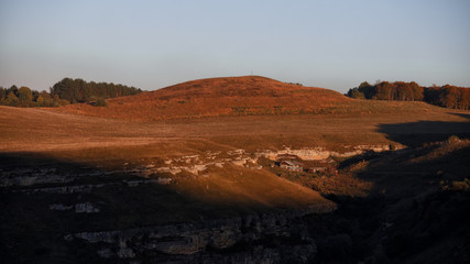 Mountain hut at sunset