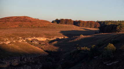 Mountain hut at sunset