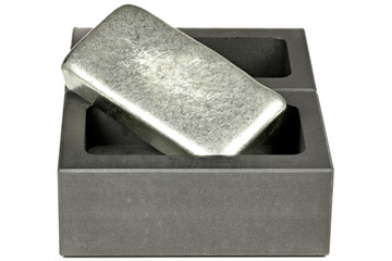 zinc bar on graphite mold isolated on white background