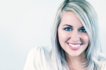 Fototapeta premium Portrait of Beautiful Blonde Girl Young Woman With Perfect Teeth