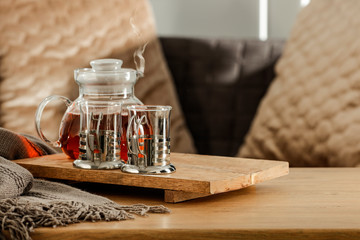 Still life details of the home living room interior on a wooden table with free space for an advertising product for Easter