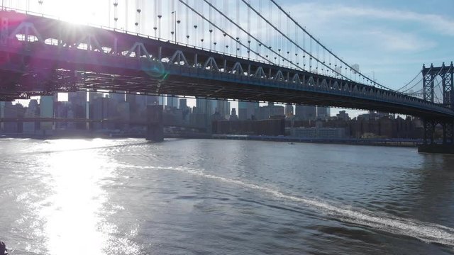 Aerial view of New York city from Manhattan Bridge and Brooklin Bridge, over East River, Unites States of America