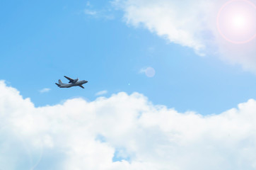 Airplane on a background of blue sky at dawn with copy space.
