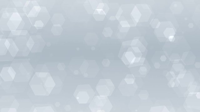This looping stock motion graphics clip shows a clean white background with hexagon bokeh lights filling up the screen.