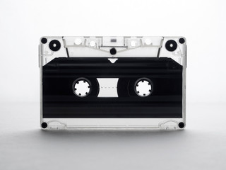 audio cassette on a white background. back light