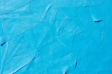 Glued pieces of blue paper close-up. Texture for design.