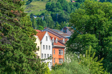 Obraz premium Top view to red roofs in Innsbruck old city, Austria.