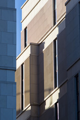 The gray building. Geometric figures.