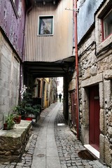 Fototapeta na wymiar Narrow street of Miragaia in Porto