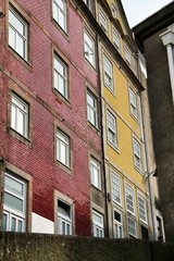 Fototapeta na wymiar Old colorful tiled facades in Porto city