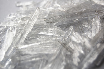 Macro background of natural menthol crystals, made of mint ingredient.  Ice, winter and  cold concept.