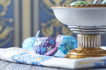 Colorful Easter Eggs on wooden background