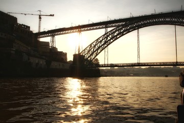 Fototapeta na wymiar Iron bridge called Luis I over the waters of the Douro river